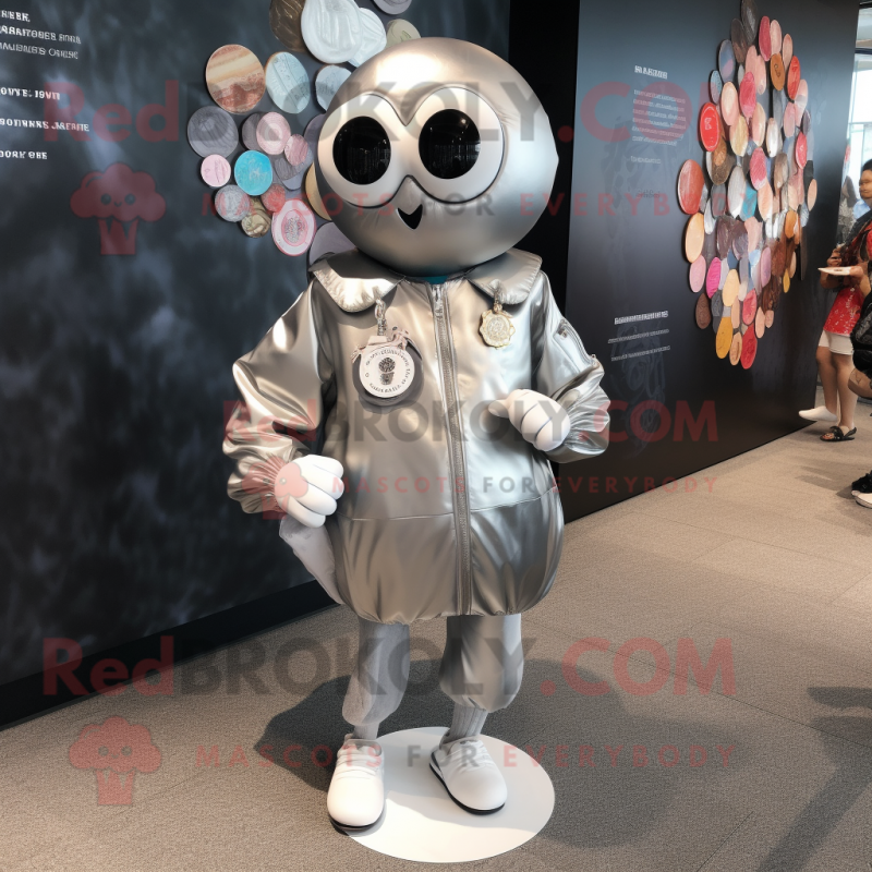 Silver Oyster mascot costume character dressed with a Bomber Jacket and Coin purses