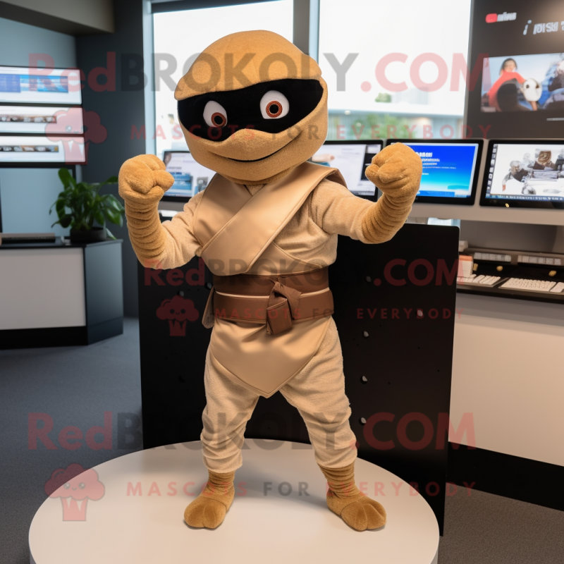 Tan Ninja mascot costume character dressed with a Skirt and Bracelets Tan Ninja mascot costume character dressed with a Skirt and Bracelets