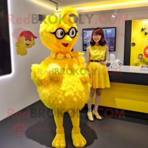 Lemon Yellow Fried Chicken mascot costume character dressed with a Mini Skirt and Keychains