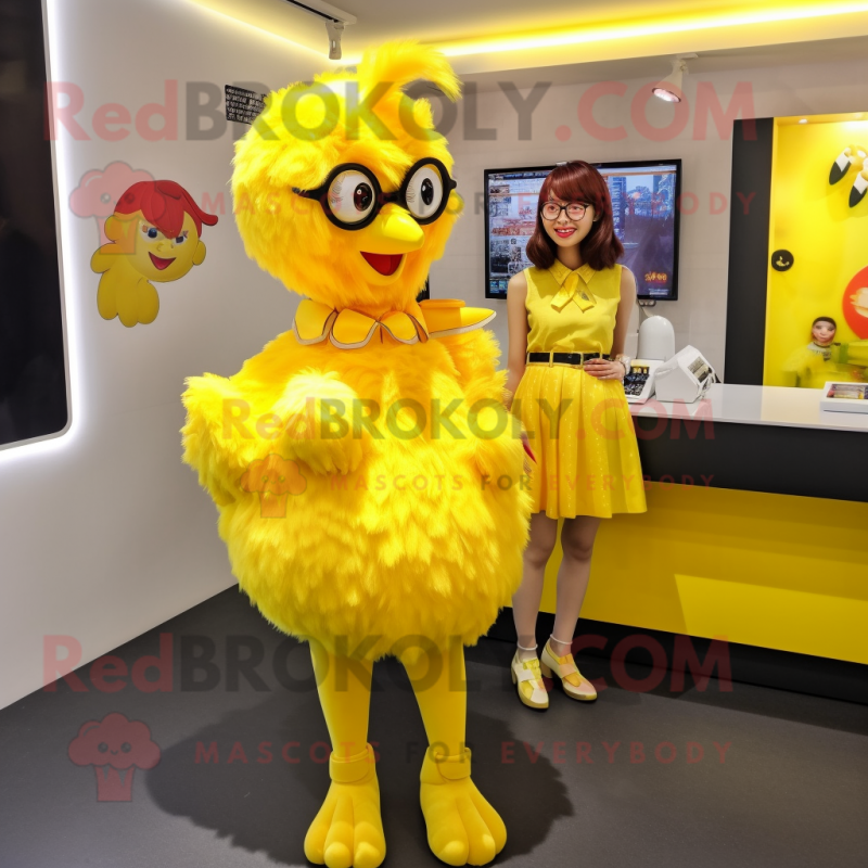 Lemon Yellow Fried Chicken mascot costume character dressed with a Mini Skirt and Keychains Lemon Yellow Fried Chicken mascot costume character dressed with a Mini Skirt and Keychains
