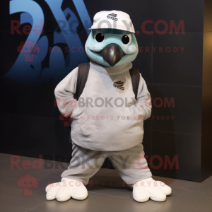 Silver Quail mascot costume character dressed with a T-Shirt and Beanies