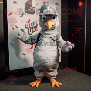 Silver Quail mascot costume character dressed with a T-Shirt and Beanies