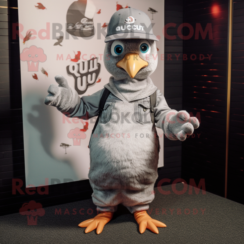 Silver Quail mascot costume character dressed with a T-Shirt and Beanies Silver Quail mascot costume character dressed with a T-Shirt and Beanies