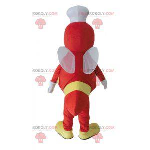 Geel en rood insectvliegmascotte met een koksmuts -