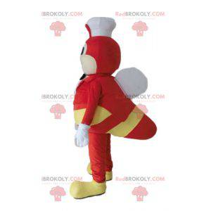 Maskot žluté a červené mušky s kuchařskou čepicí -