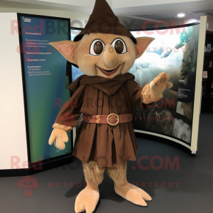 Brown Elf mascot costume character dressed with a Shorts and Shawl pins