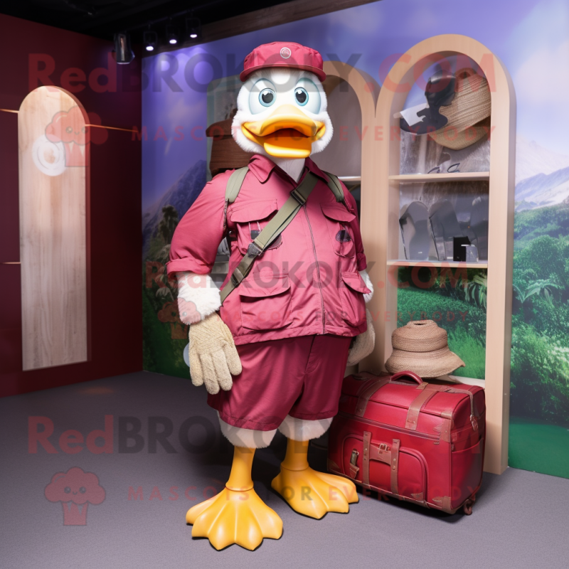 Maroon Muscovy Duck mascot costume character dressed with a Cargo Shorts and Messenger bags