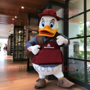 Maroon Muscovy Duck mascot costume character dressed with a Cargo Shorts and Messenger bags