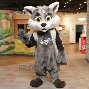 Gray Bobcat mascot costume character dressed with a Overalls and Shawls