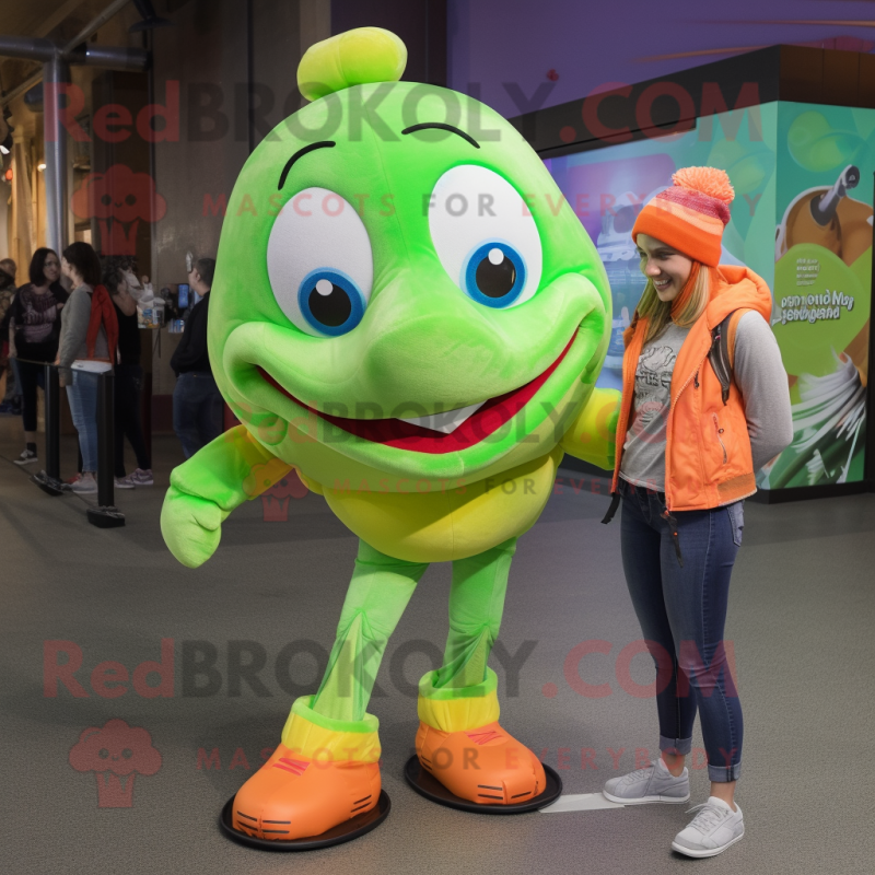 Lime Green Clown Fish mascot costume character dressed with a Skinny Jeans and Shoe laces Lime Green Clown Fish mascot costume character dressed with a Skinny Jeans and Shoe laces