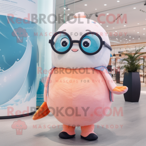 Peach Narwhal mascot costume character dressed with a Vest and Eyeglasses
