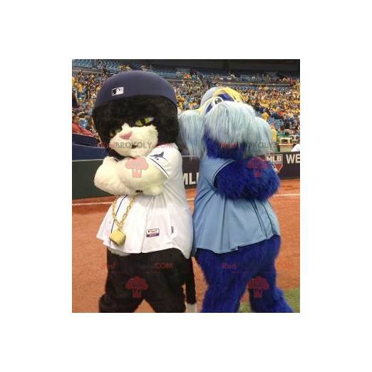 2 mascots a black and white cat and a blue furry man -