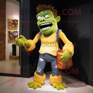 Gold Frankenstein'S Monster mascot costume character dressed with a Jeans and Messenger bags