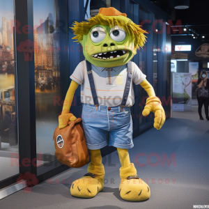 Gold Frankenstein'S Monster mascot costume character dressed with a Jeans and Messenger bags