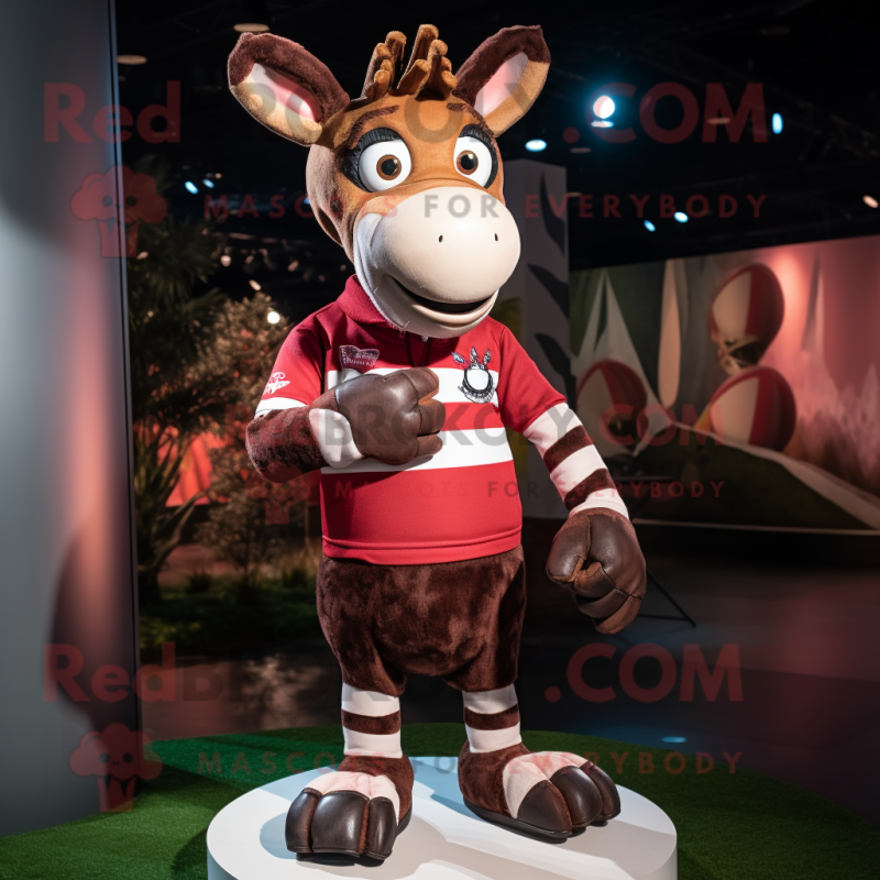 Maroon Okapi mascot costume character dressed with a Rugby Shirt and Mittens Maroon Okapi mascot costume character dressed with a Rugby Shirt and Mittens