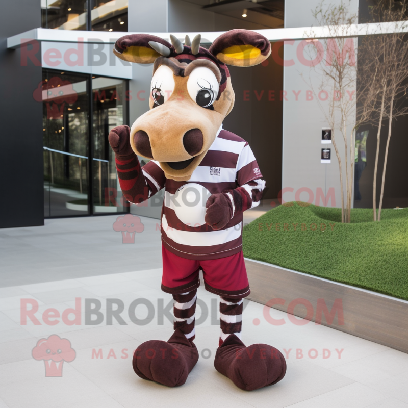 https://www.redbrokoly.com/194138-large_default/maroon-okapi-mascot-costume-character-dressed-with-a-rugby-shirt-and-mittens.jpg
