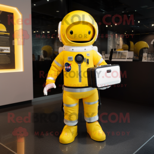 Yellow Astronaut mascot costume character dressed with a Tuxedo and Briefcases