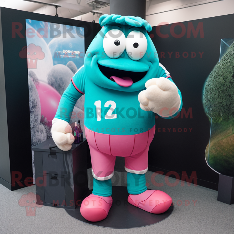 Turquoise Pink mascot costume character dressed with a Rugby Shirt and Ties Turquoise Pink mascot costume character dressed with a Rugby Shirt and Ties