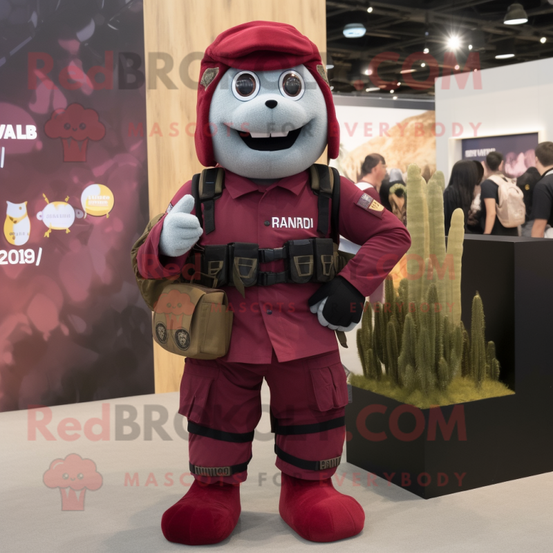 Maroon Para Commando mascot costume character dressed with a Shorts and Coin purses Maroon Para Commando mascot costume character dressed with a Shorts and Coin purses