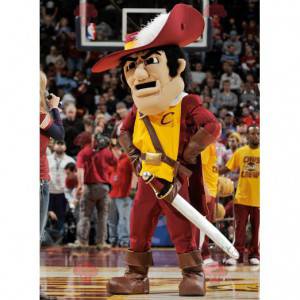 Musketeer mascot in traditional red and yellow dress -