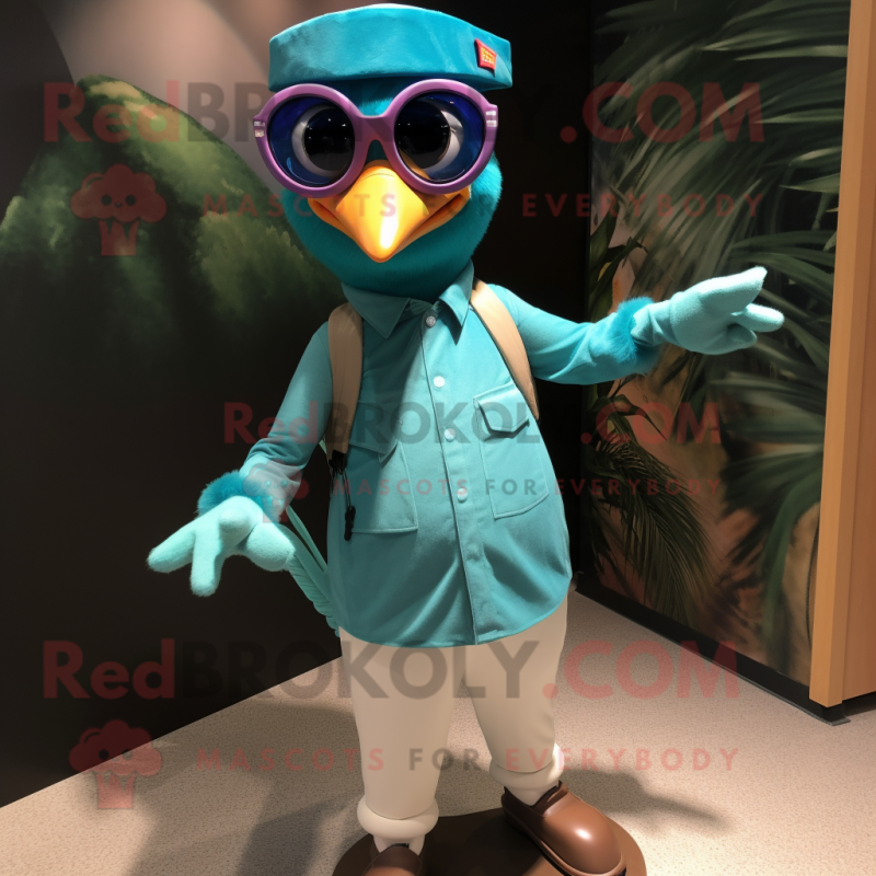 Teal Woodpecker mascot costume character dressed with a Henley Tee and Sunglasses Teal Woodpecker mascot costume character dressed with a Henley Tee and Sunglasses