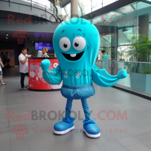 Turquoise Jellyfish mascot costume character dressed with a Flare Jeans and Smartwatches