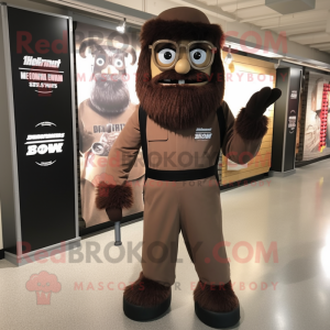 Brown Knife Thrower mascot costume character dressed with a Jumpsuit and Eyeglasses