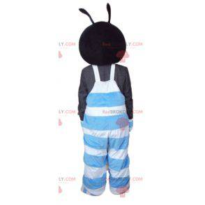 Black and pink insect mascot in blue and white overalls -