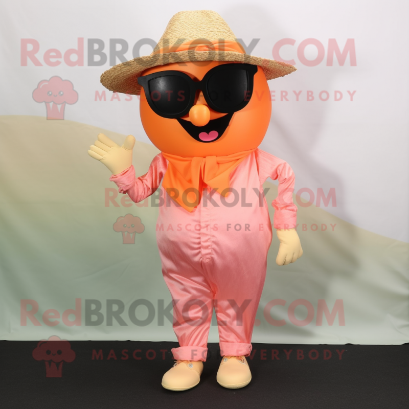 Peach Scarecrow mascot costume character dressed with a Capri Pants and Sunglasses Peach Scarecrow mascot costume character dressed with a Capri Pants and Sunglasses