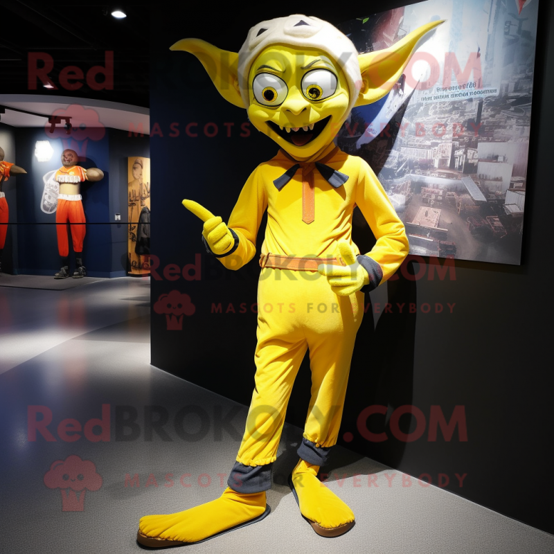 Lemon Yellow Vampire mascot costume character dressed with a Cargo Pants and Anklets Lemon Yellow Vampire mascot costume character dressed with a Cargo Pants and Anklets