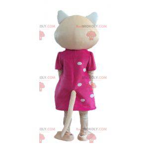 Beige Katzenmaskottchen mit einem rosa Kleid und blauen Augen -