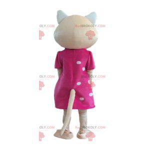 Mascote gato bege com vestido rosa e olhos azuis -