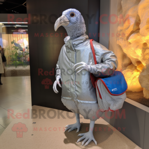 Silver Guinea Fowl mascot costume character dressed with a Windbreaker and Handbags