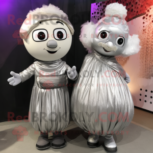 Silver Meatballs mascot costume character dressed with a Maxi Dress and Mittens