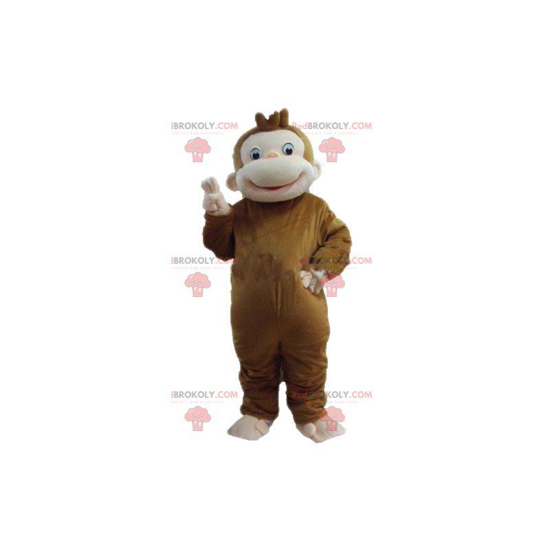 Mascota mono marrón y rosa muy jovial y sonriente -