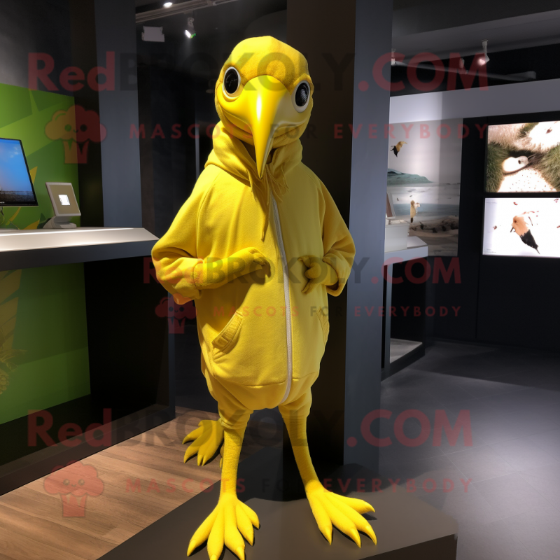Lemon Yellow Archeopteryx mascot costume character dressed with a Hoodie and Foot pads Lemon Yellow Archeopteryx mascot costume character dressed with a Hoodie and Foot pads