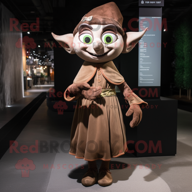 Brown Elf mascot costume character dressed with a Evening Gown and Messenger bags Brown Elf mascot costume character dressed with a Evening Gown and Messenger bags