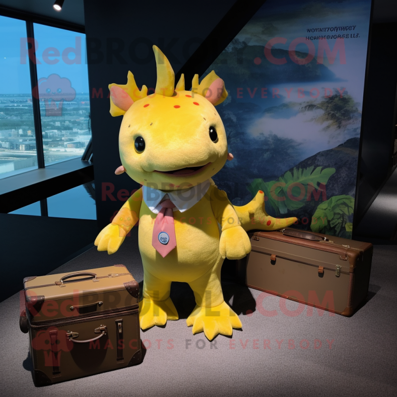 Yellow Axolotls mascot costume character dressed with a Romper and Briefcases Yellow Axolotls mascot costume character dressed with a Romper and Briefcases