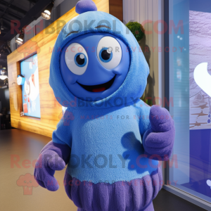 Blue Plum mascot costume character dressed with a Sweater and Mittens