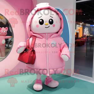 Pink Soccer Ball mascot costume character dressed with a Parka and Tote bags