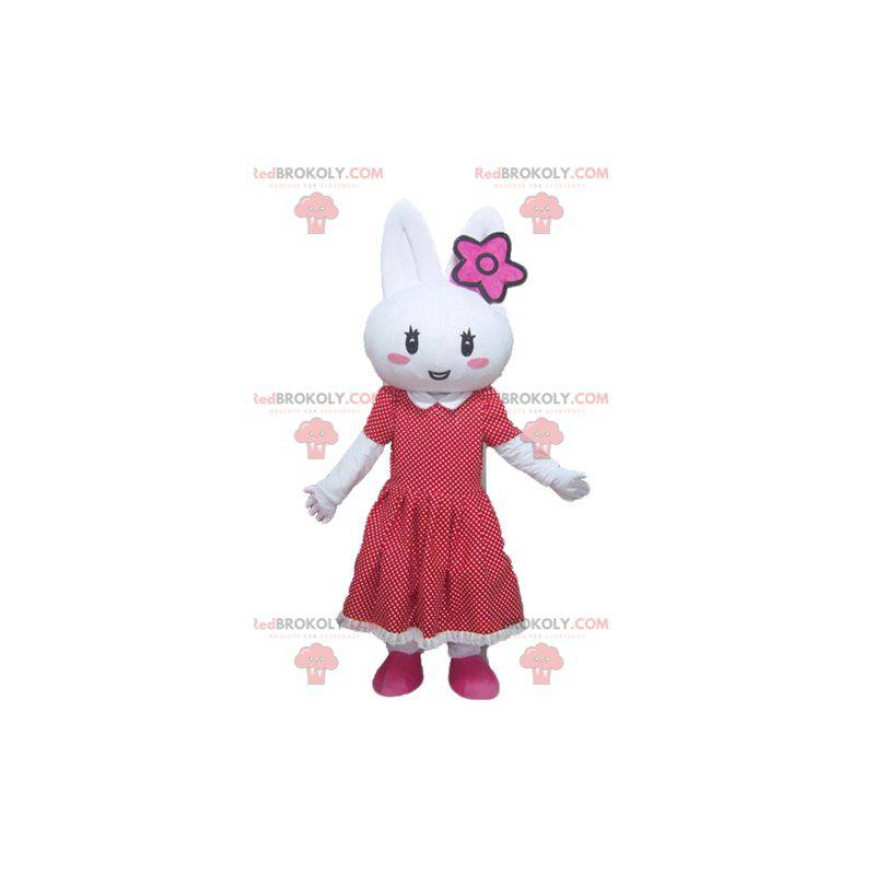 Mascote coelho branco com vestido de bolinhas vermelhas -