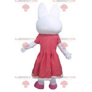 Mascote coelho branco com vestido de bolinhas vermelhas -