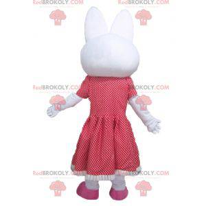 Mascotte de lapin blanc avec une robe rouge à pois -
