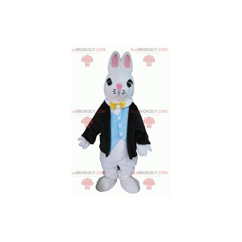 Biała maskotka królik ubrana w bardzo elegancki kostium -