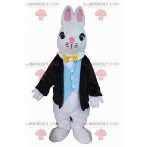 Vit kaninmaskot klädd i en mycket elegant kostym -