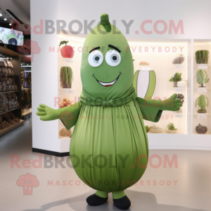 Olive Cucumber mascot costume character dressed with a Pleated Skirt and Belts