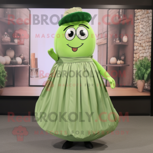 Olive Cucumber mascot costume character dressed with a Pleated Skirt and Belts