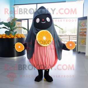 Black Grapefruit mascot costume character dressed with a Romper and Shawls