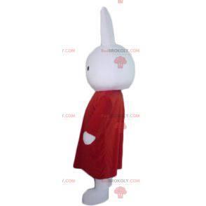 Mascota de conejo de peluche blanco con un vestido largo rojo -