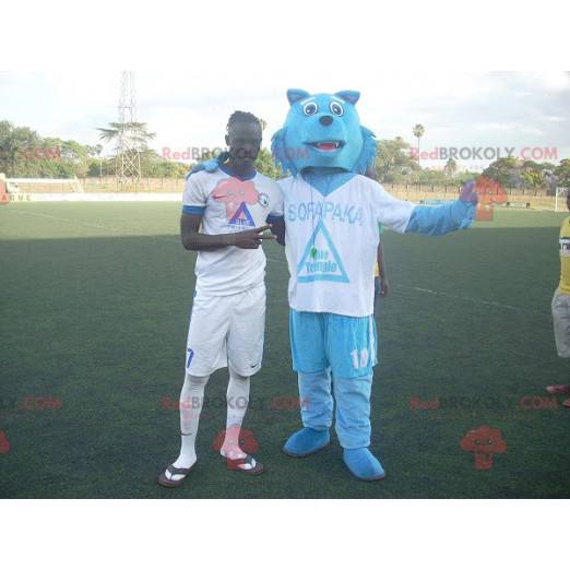 Mascote lobo azul em roupas esportivas - Redbrokoly.com